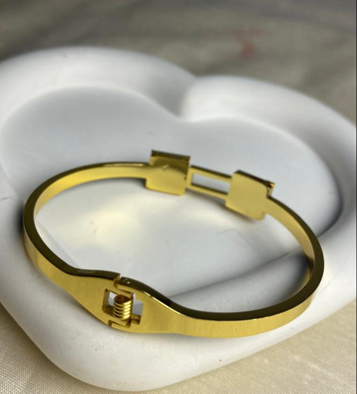 Gold Bracelet with Bold Black Squares