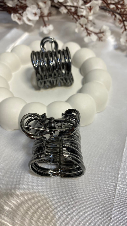 Black Ribbed Metal Clature