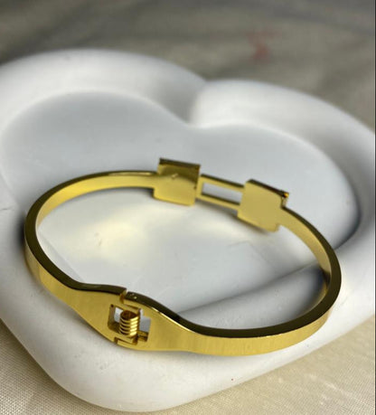 Gold Bracelet with Bold Black Square