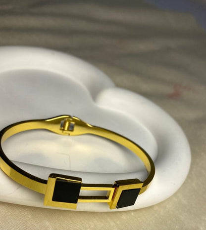 Gold Bracelet with Bold Black Square